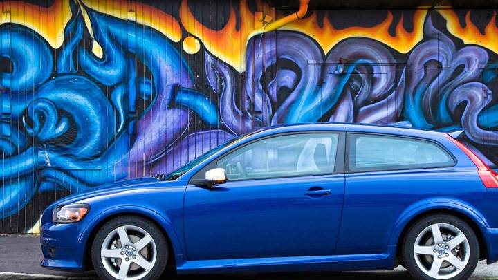 Side Pose Of 2010 Volvo C30 In Blue N Painted Background